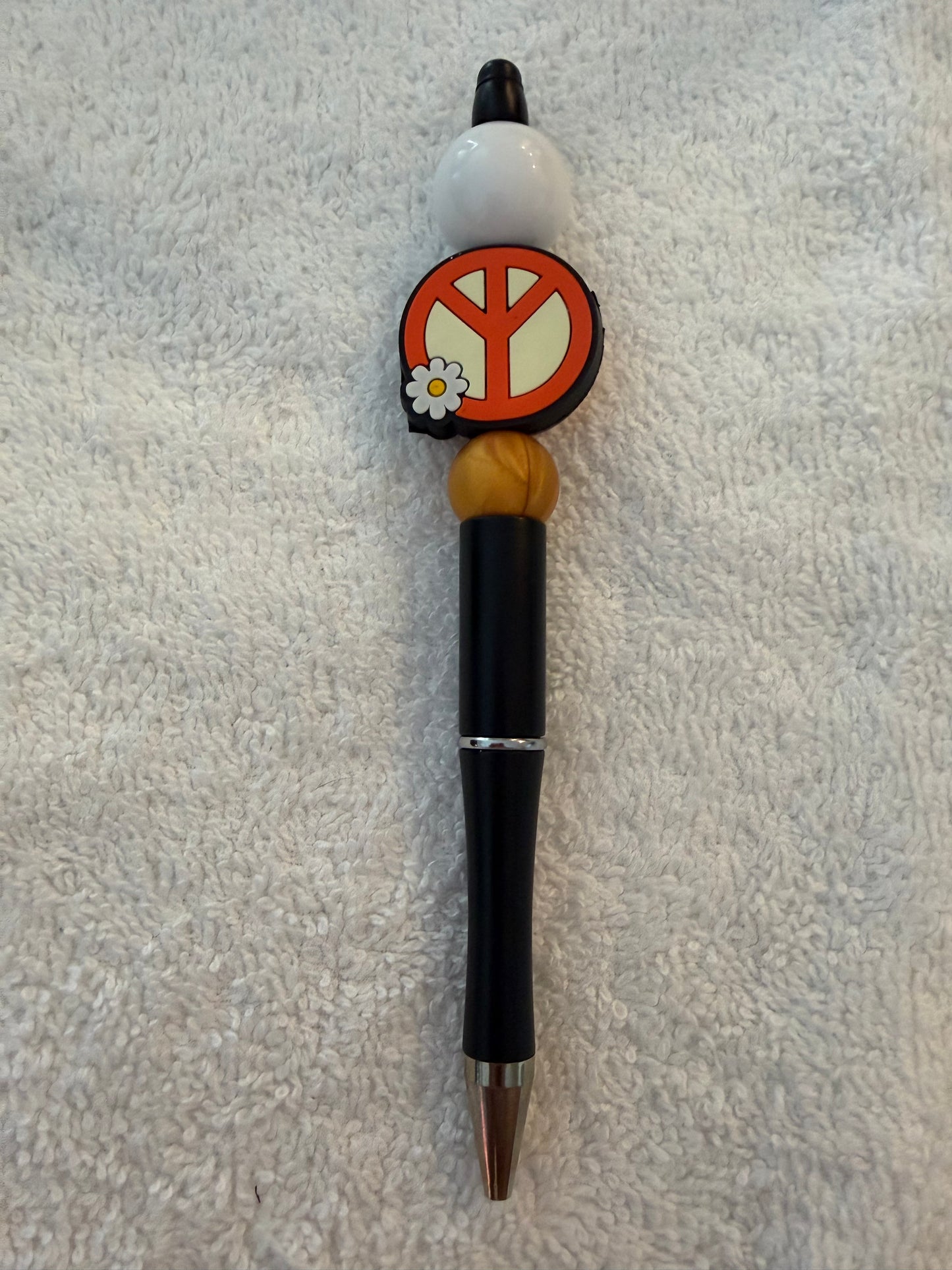 Red peace sign pen