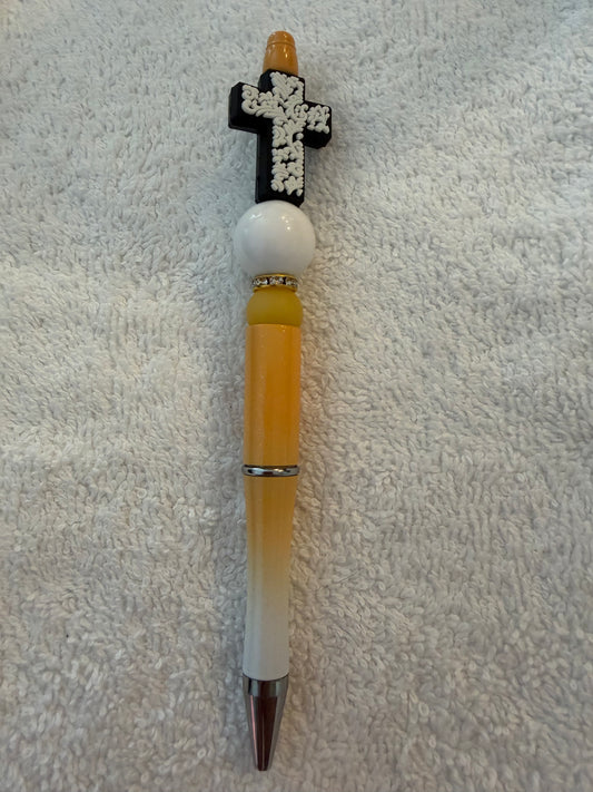 White cross pen