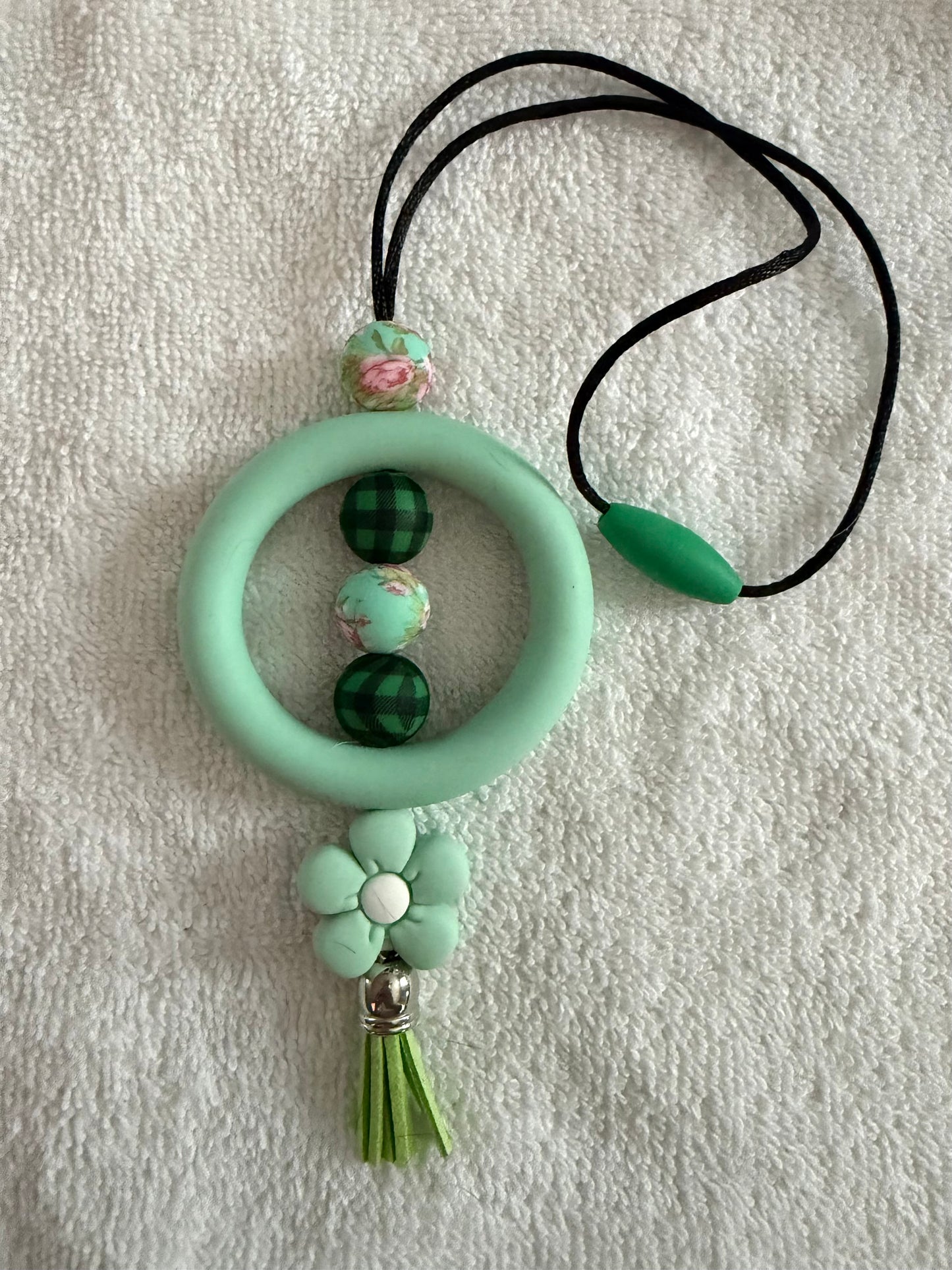 Green car charm