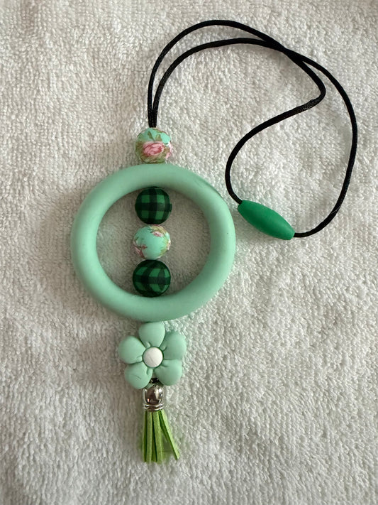 Green car charm