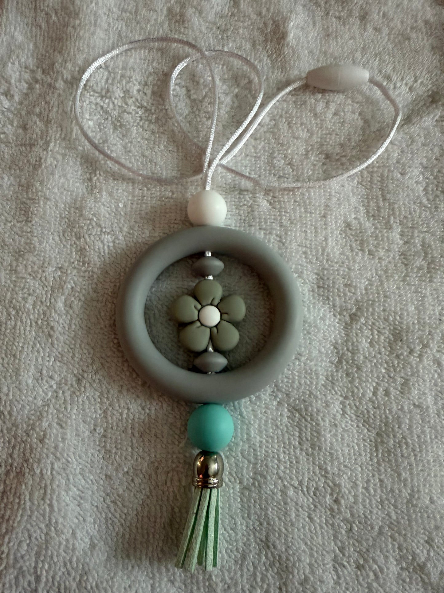 green/grey car charm